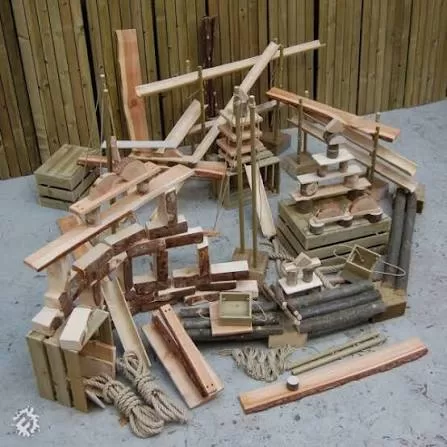 A creative construction made with wooden blocks and loose parts at Moss Hall Playcentre